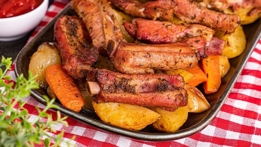 Porc et pommes de terre au four : recette facile et savoureuse