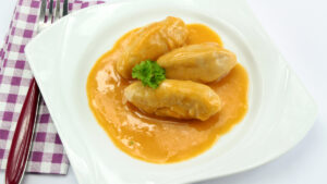 Quenelles de brochet à la bisque de homard : recette raffinée