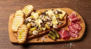 Raclette aux champignons et croûtons : recette originale à découvrir