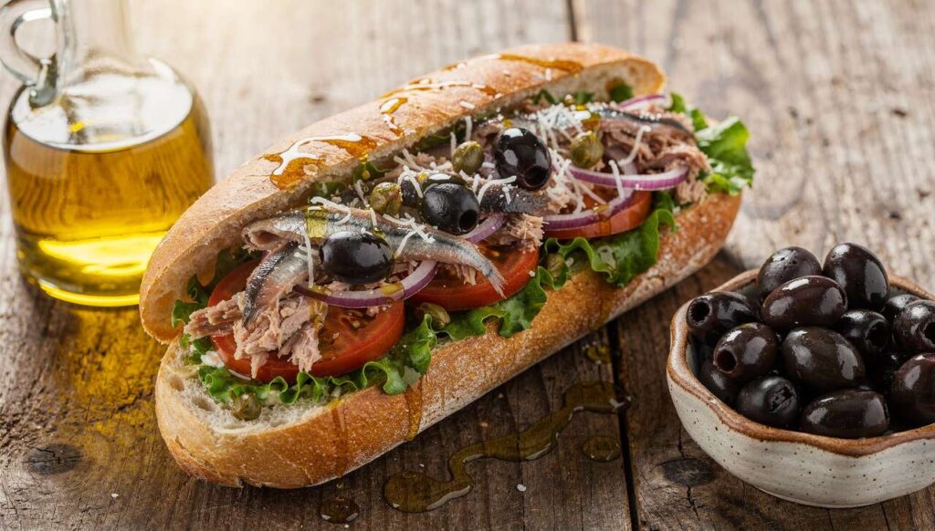 Recette de pan bagnat au thon, crudités et fromage